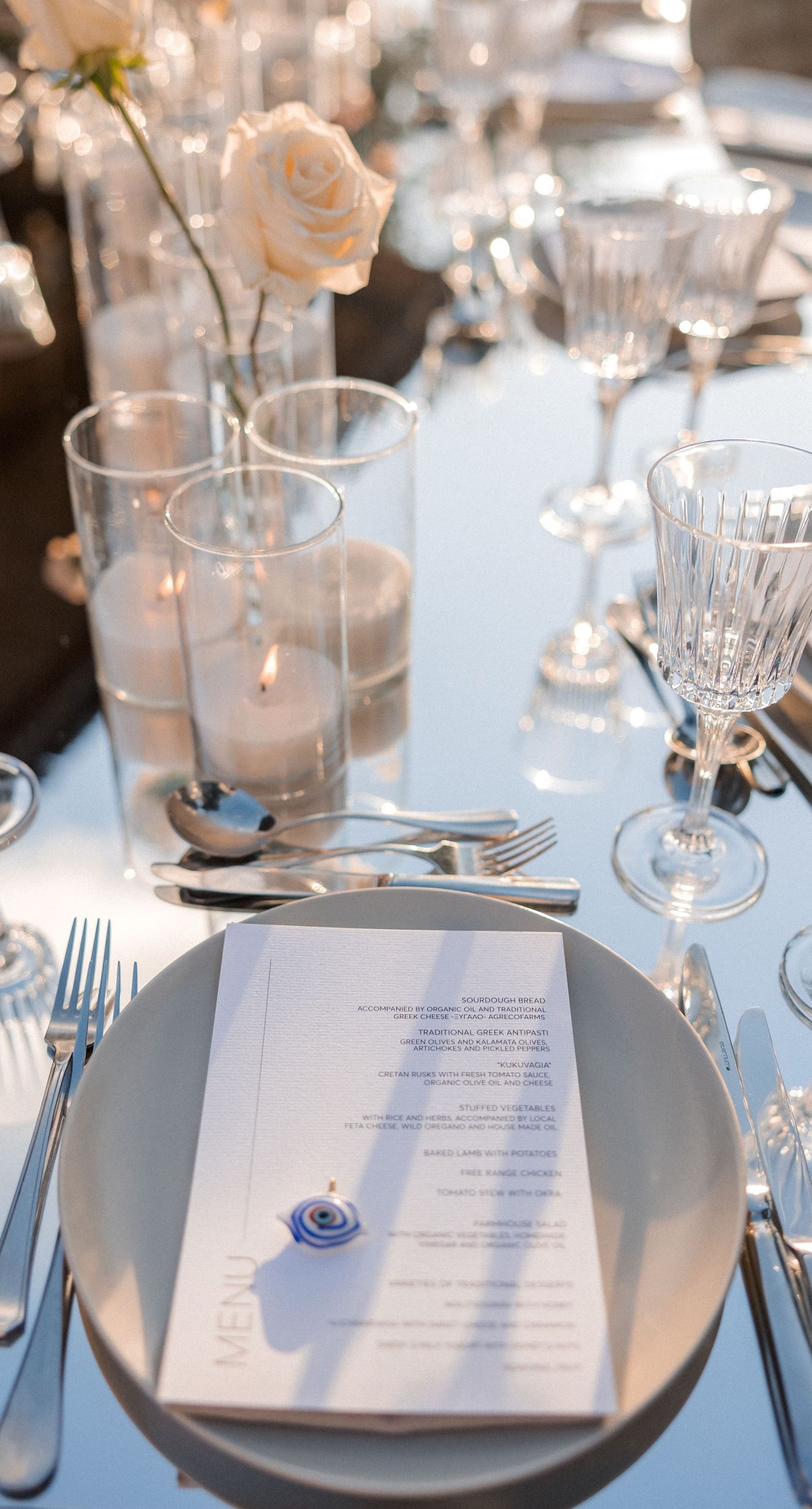  Sasha & Alex - Amidst a breathtaking landscape, this exquisite showcase captures the essence of romance and elegance. Soft hues of blush and ivory blend seamlessly with lush greenery, creating an ethereal garden-like setting. The mirrored aisle reflects the joyful union, adding a touch of glamor to the scene. Delicate florals, thoughtfully arranged, frame the moment, enhancing the dreamy, sophisticated atmosphere. This outdoor celebration perfectly balances natural beauty with refined artistry, embodying the timeless allure of love in a serene, picturesque locale. - Photo 8