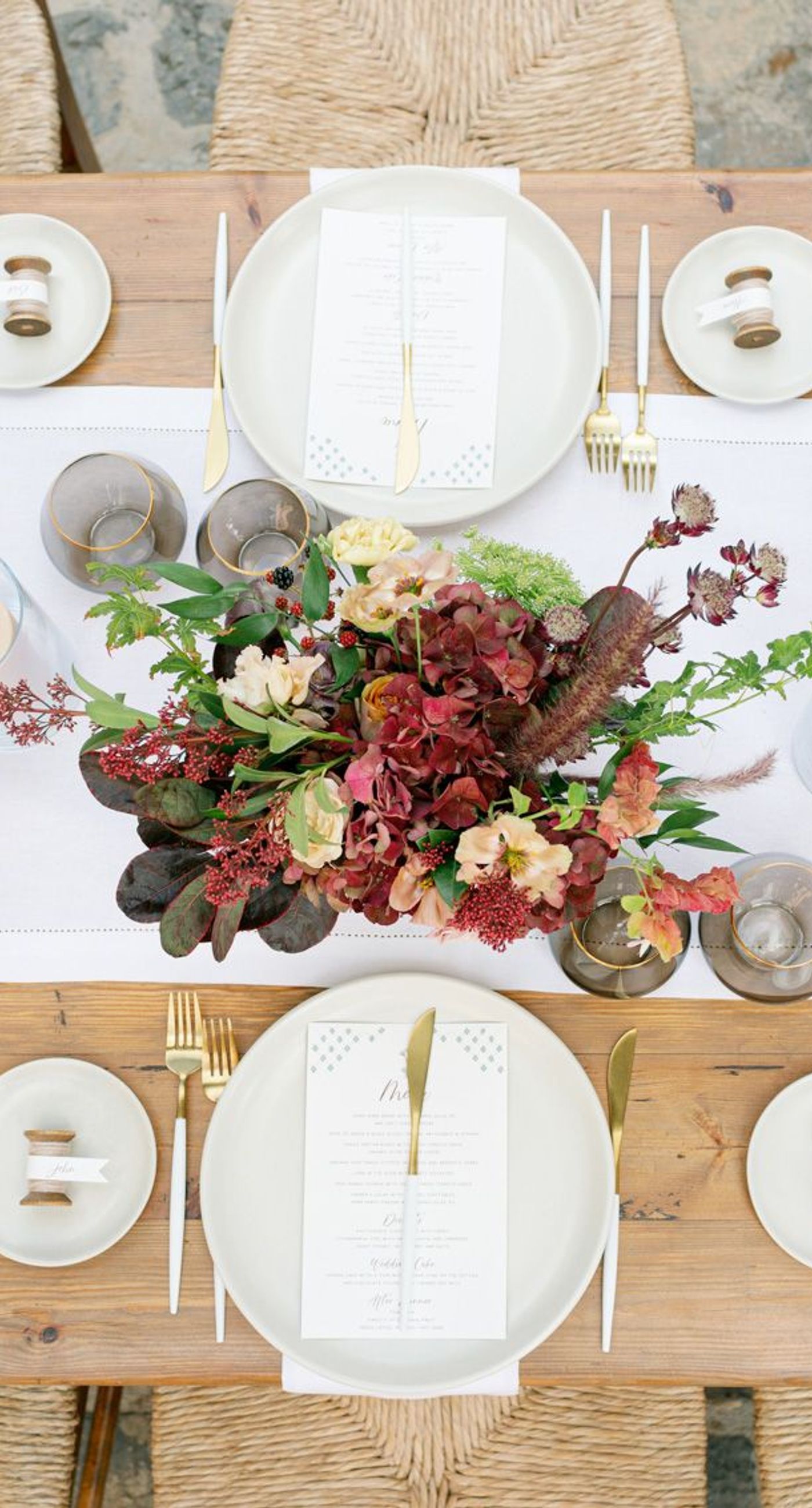 Chiara & Marco - In an elegant dance of romance and subtlety, a couple is enveloped in a moment of intimate anticipation. Their surroundings whisper of nature's abundance, while the soft, muted colors of the bouquet enhance the gentle harmony between the blue suit and white gown. The florist's artistry is evident in the meticulous arrangement of delicate blooms and verdant leaves, highlighting the signature flair for understated sophistication. This serene union of floral grace and human connection brings forth an aesthetic that is both timeless and heartwarming, ideal for a setting that celebrates love and nature in its simplest form. - Photo 10