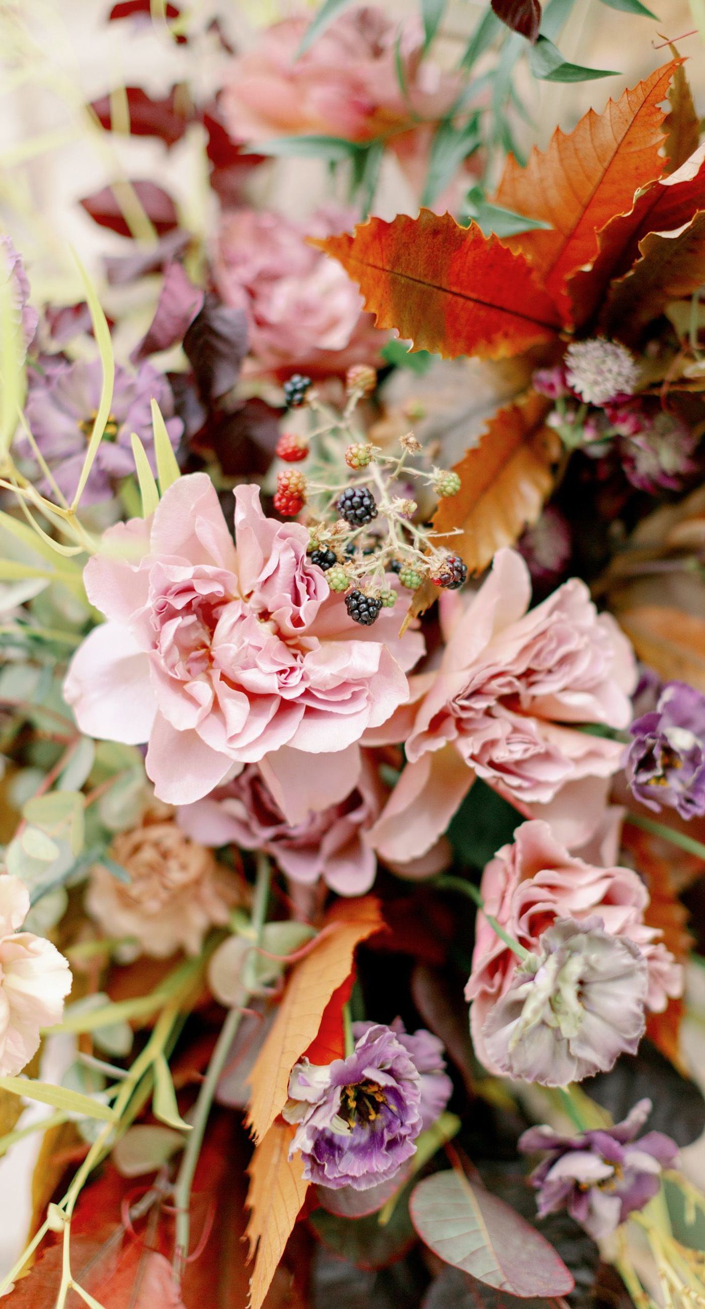 Chiara & Marco - In an elegant dance of romance and subtlety, a couple is enveloped in a moment of intimate anticipation. Their surroundings whisper of nature's abundance, while the soft, muted colors of the bouquet enhance the gentle harmony between the blue suit and white gown. The florist's artistry is evident in the meticulous arrangement of delicate blooms and verdant leaves, highlighting the signature flair for understated sophistication. This serene union of floral grace and human connection brings forth an aesthetic that is both timeless and heartwarming, ideal for a setting that celebrates love and nature in its simplest form. - Photo 3