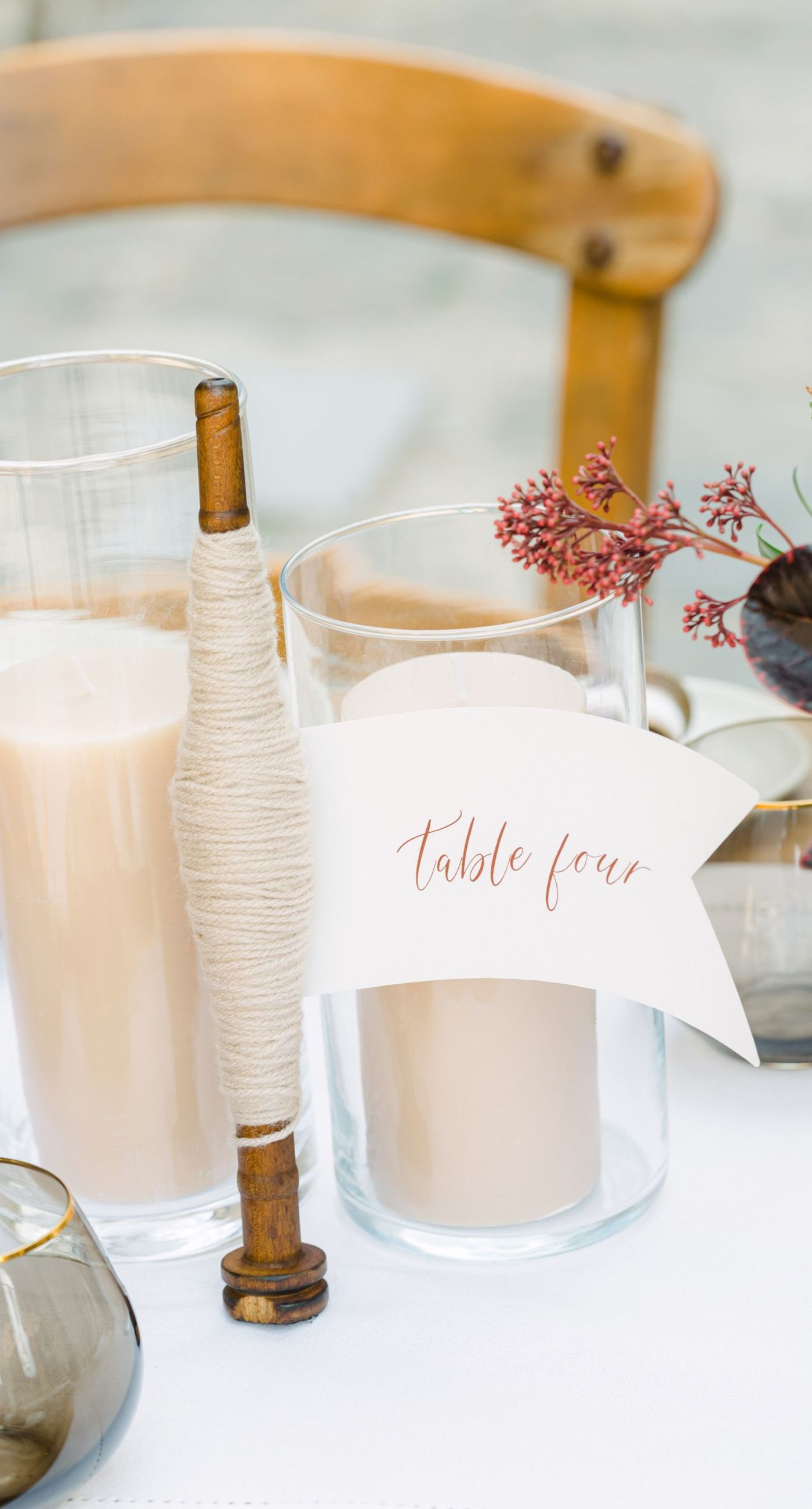 Chiara & Marco - In an elegant dance of romance and subtlety, a couple is enveloped in a moment of intimate anticipation. Their surroundings whisper of nature's abundance, while the soft, muted colors of the bouquet enhance the gentle harmony between the blue suit and white gown. The florist's artistry is evident in the meticulous arrangement of delicate blooms and verdant leaves, highlighting the signature flair for understated sophistication. This serene union of floral grace and human connection brings forth an aesthetic that is both timeless and heartwarming, ideal for a setting that celebrates love and nature in its simplest form. - Photo 12