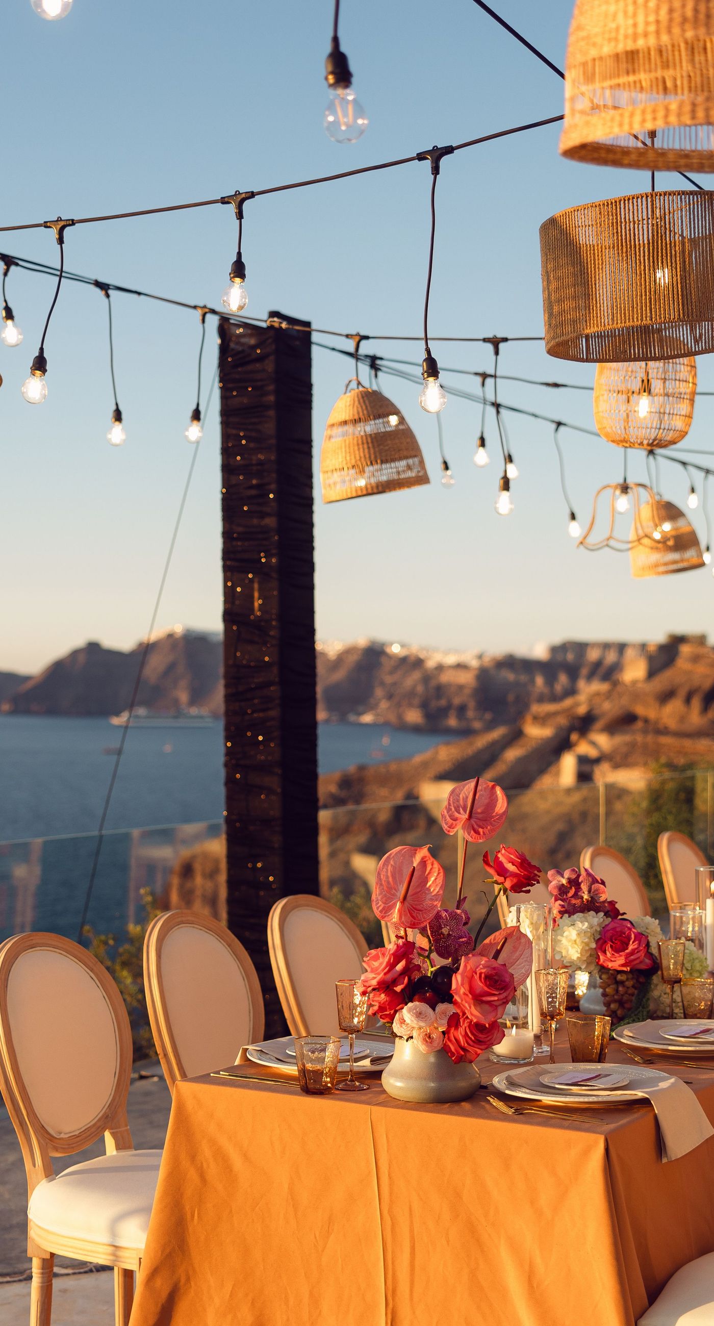 Chris & Jazmin - In a dreamlike setting beneath the soft embrace of the sun, this captivating work embodies a perfect union of elegance and romance. The delicate lace of her gown interlaces with the tender embrace of her partner, creating an ethereal atmosphere amidst the tranquil architecture. A vibrant bouquet bursts with life, featuring an exquisite medley of fuchsia, orange, and deep crimson blooms, each petal whispering tales of timeless love. The muted tones of the setting contrast beautifully with the vivid flowers, offering a glimpse into a serene world where artistry and nature harmonize flawlessly. This presentation speaks to the profound beauty that can blossom in moments of connection. - Photo 7