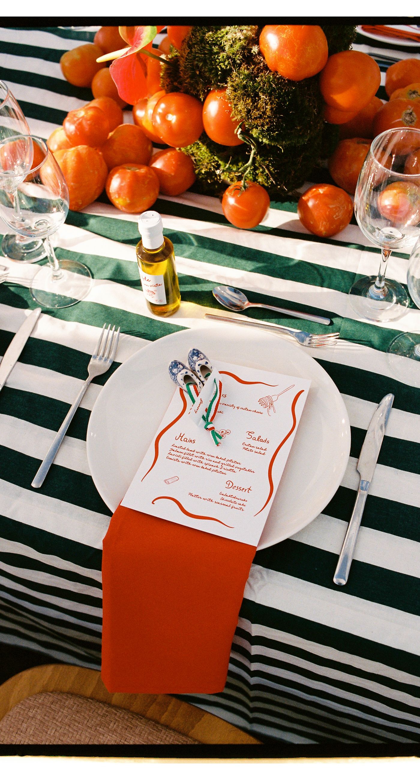 Garden Ceremony - A complete wedding experience designed with a focus on color, flow, and a strong sense of place. The ceremony is framed by vibrant florals in warm tones, creating a natural and expressive setting for the couple. The dinner that follows is defined by long tables, rhythmic textiles, and unexpected details that introduce a sense of playful elegance. A project that balances structure and ease, designed to feel authentic and experienced without effort. - Photo 9