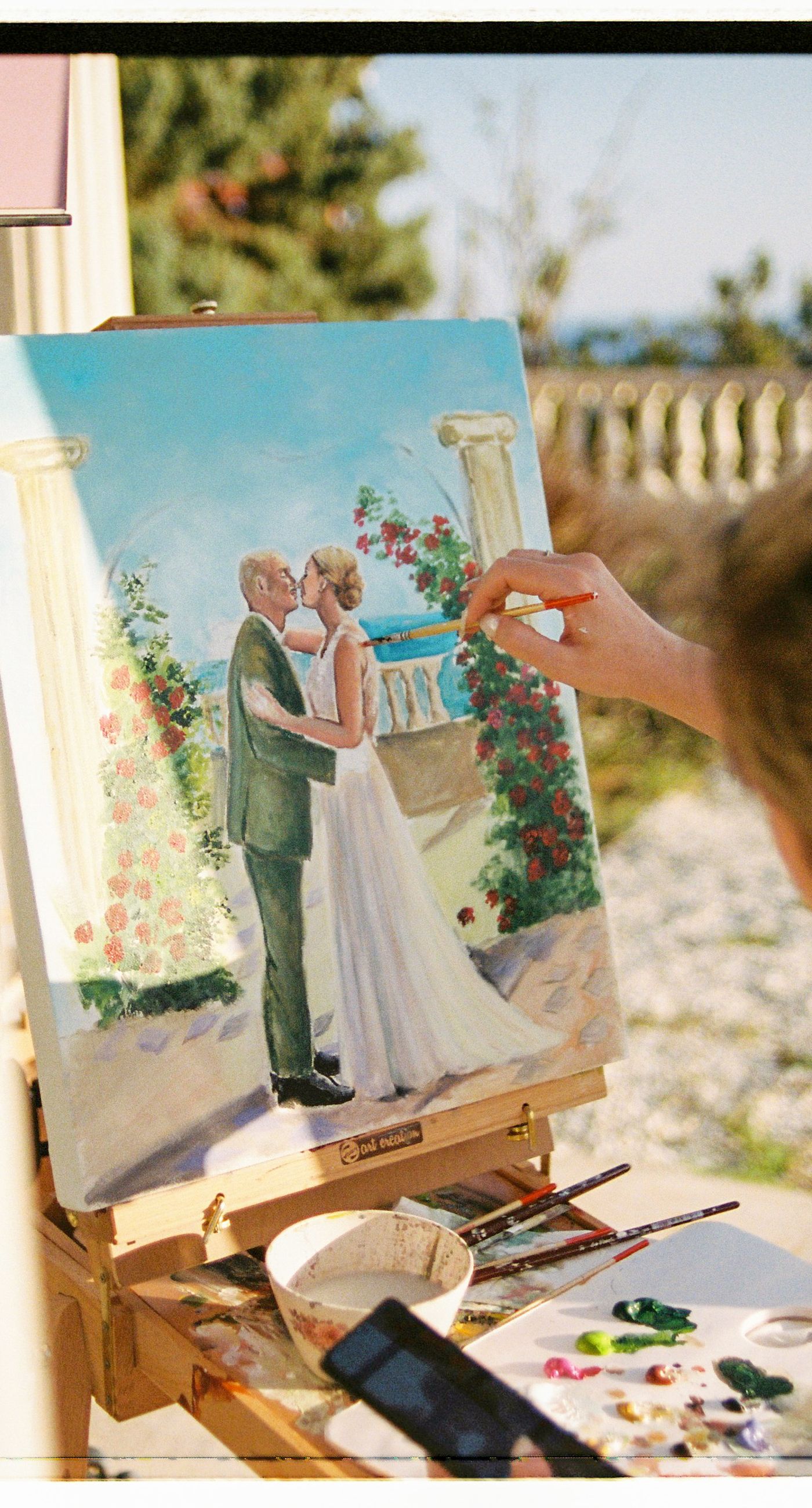 Garden Ceremony - A complete wedding experience designed with a focus on color, flow, and a strong sense of place. The ceremony is framed by vibrant florals in warm tones, creating a natural and expressive setting for the couple. The dinner that follows is defined by long tables, rhythmic textiles, and unexpected details that introduce a sense of playful elegance. A project that balances structure and ease, designed to feel authentic and experienced without effort. - Photo 6