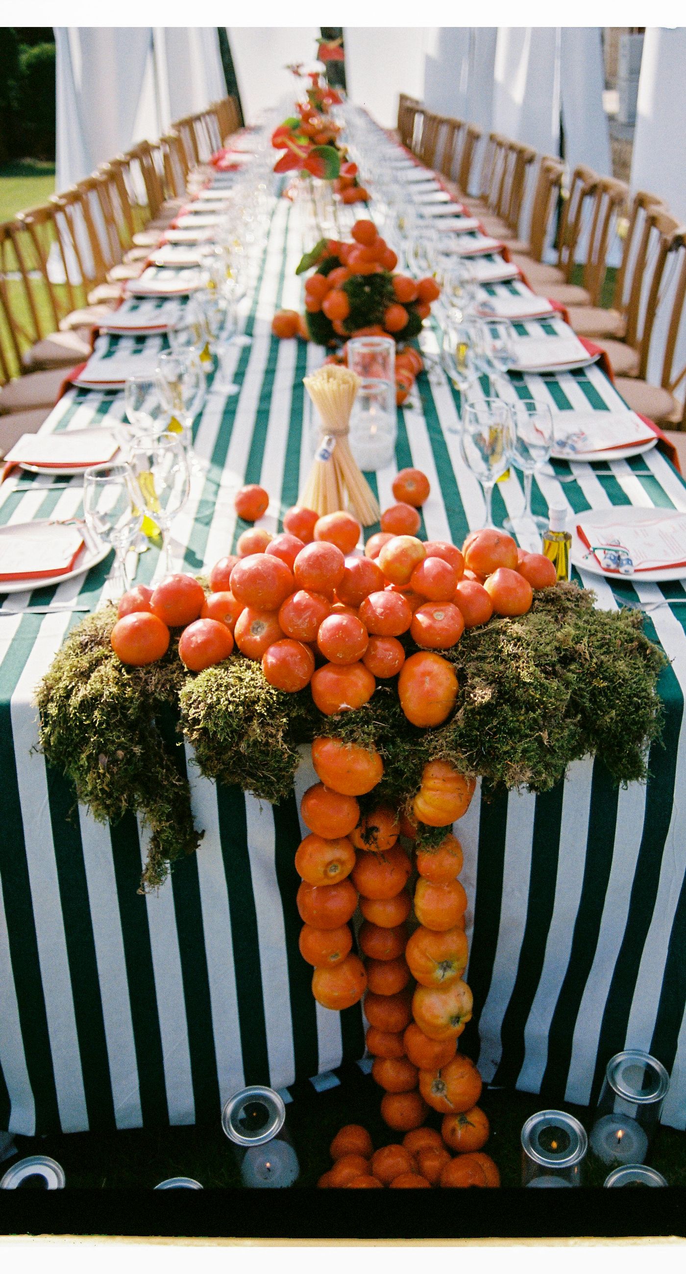 Garden Ceremony - A complete wedding experience designed with a focus on color, flow, and a strong sense of place. The ceremony is framed by vibrant florals in warm tones, creating a natural and expressive setting for the couple. The dinner that follows is defined by long tables, rhythmic textiles, and unexpected details that introduce a sense of playful elegance. A project that balances structure and ease, designed to feel authentic and experienced without effort. - Photo 12