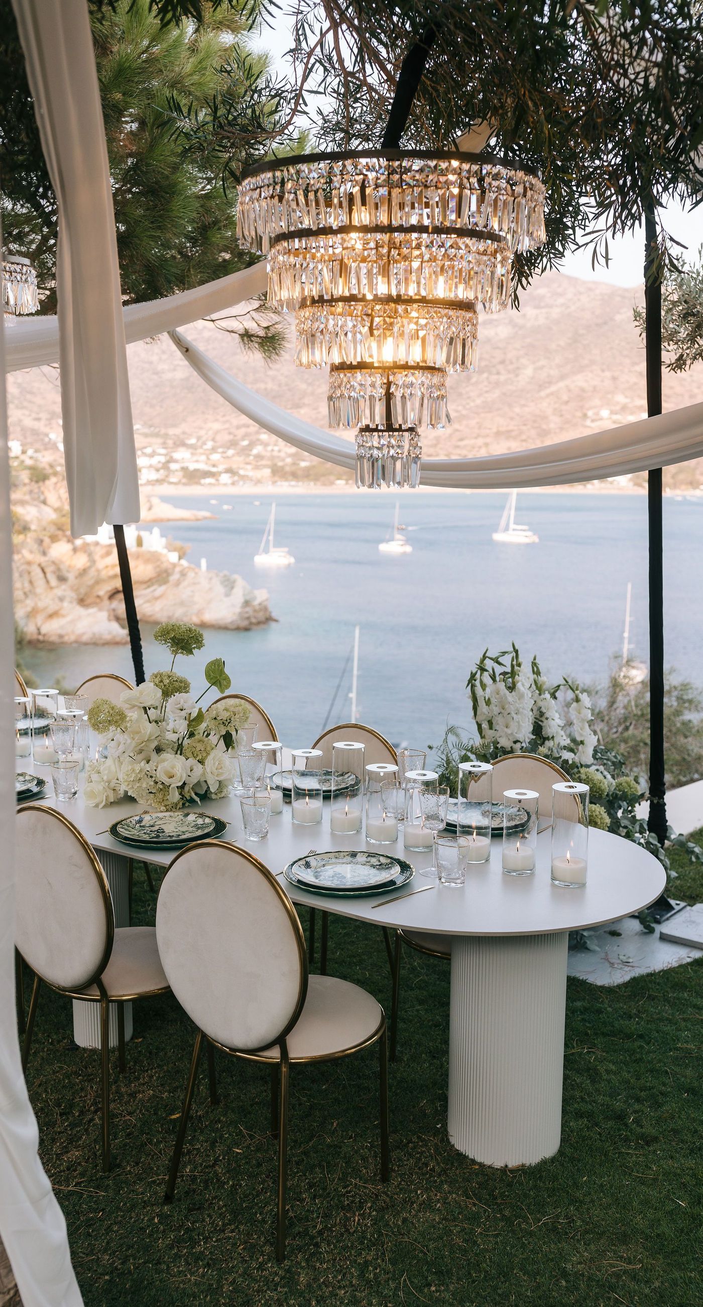 Kala & Kerwin - Bathed in the warm glow of a setting sun, the bouquet of creamy white blooms and eucalyptus whispers elegance and romance. It complements the ethereal lace details of the attire, creating a harmonious blend of textures and colors. The backdrop of rustic stone steps hints at a location where nature and romance intertwine seamlessly, offering a timeless, serene beauty. This work encapsulates a moment of profound connection and grace, emphasizing the pure emotional essence captured on a special day. - Photo 5